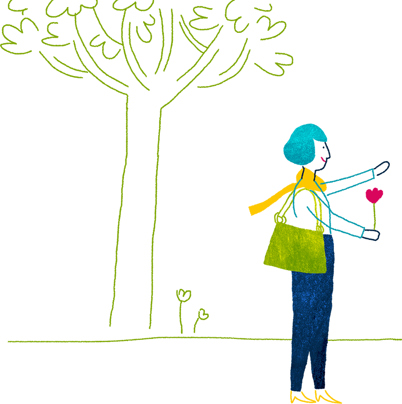 Une aidante tend une fleur devant un arbre